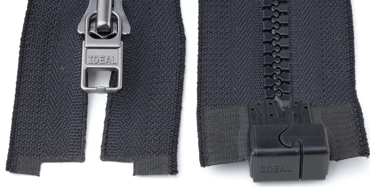 The bottom of a black MagZip: the slider on the left half and the magnetic base on the right half
